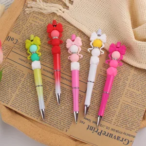 Penna a sfera DIY con fiocco in silicone e corpo in plastica colorata per scrittura creativa.