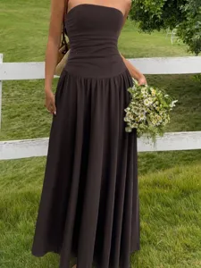 Elegant brown strapless ruched maxi dress for summer beach vacation and outdoor styling