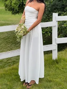 Elegant white strapless ruched maxi dress perfect for summer beach resort and vacation