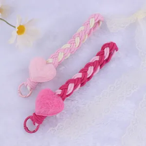 Cute plush heart braided phone lanyard and bag charm keychain for women winter accessory.