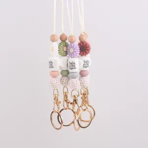 Siliconen margriet houten kralen lanyard sleutelhanger met koffiekopje bedels.