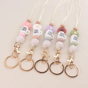 Siliconen madeliefje koffiekopje lanyard sleutelhanger met houten kralen set.