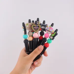 DIY Lehrer Themen Perlenstift Set mit bunten Silikonperlen und schönen Dekorationen.