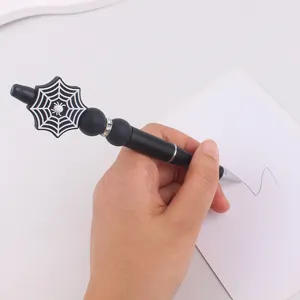 Penna gel creativa Halloween ragnatela con topper in silicone e perle di strass, inchiostro nero.