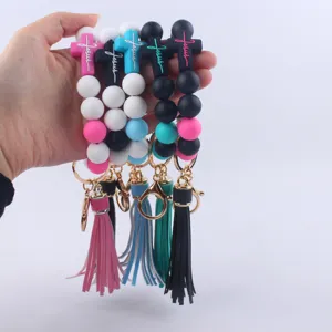 Silicone beaded wristlet keychain with cross tassel, cute boho key ring bracelet for women accessories.