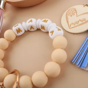 Muttertag Silikon Perlen Armband Schlüsselanhänger mit Holz Herz Anhänger Quaste.