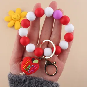Llavero de pulsera de cuentas de silicona con colgante de manzana roja para profesores.