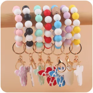 Silicone bead wristlet keychain with cute cow head wooden pendant for women keys bag charm.