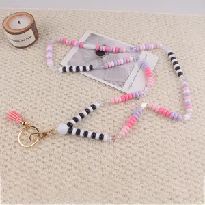 Acryl platte kralen lanyard sleutelhanger met kwastje detail, kleurrijk kralenontwerp.