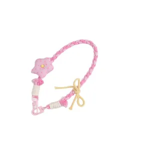Handgemachte rosa geflochtene Handykette mit Stern und Schleife für Tasche und Tasse.