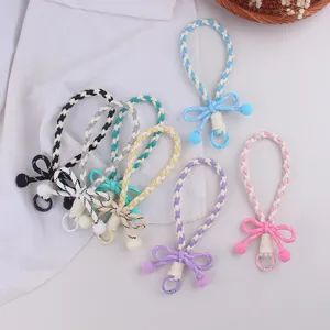 Dolce Cordino per Telefono Intrecciato Con Fiocco e Pompon di Peluche Simpatico Portachiavi in Silicone Catena per Cellulare Regalo per Donna