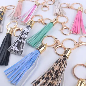Bunte Leder Quasten Schlüsselanhänger mit goldenen Metall Karabinern für Taschen.
