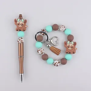 DIY silicone beaded pen and wristlet keychain set, cute highland cow charm, handmade creative gift.