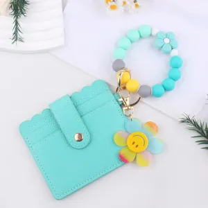Silikon Perlen Armband Schlüsselanhänger mit Kartenhalter und glitzernden Smiley Blumen Anhänger.