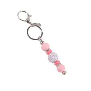 Silicone bead keychain with sparkling crystal rhinestones and metal keyring for bags.
