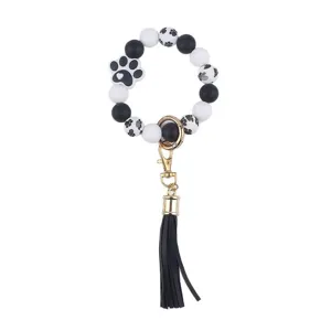 Silicone paw print beaded wristlet keychain with black tassel for keys and wallets main view