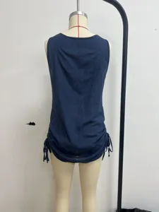 Back view detail of a dark blue cotton drawstring sleeveless tunic cover-up for women