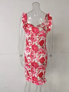 Back view of elegant white floral sleeveless mini dress featuring red rose print and ruffles