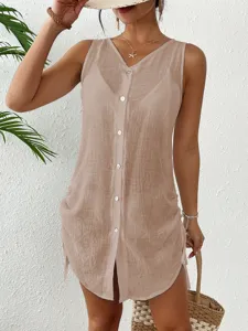 Detail of beige cotton sleeveless cover-up featuring button-down front and side drawstring.