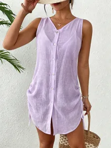 Detail view of a purple sleeveless cotton button-up dress with drawstring sides.