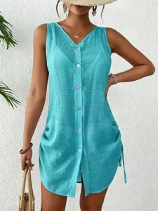 Front view of summer cotton sleeveless cover-up dress with button closure and drawstring detail
