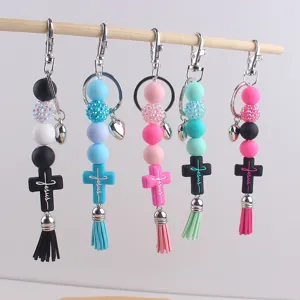 Silicone beaded cross tassel keychain stylish bag charm religious accessory multi-color.