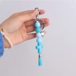Blue silicone beaded keychain with cross pendant tassel stylish bag charm accessory for daily use