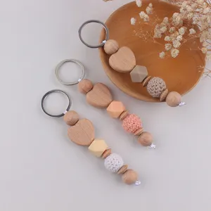 Wooden heart crochet bead keychain detail, handmade bag charm accessory for daily use.