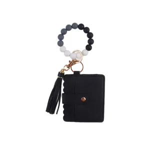 Porte-clés bracelet en perles de silicone avec portefeuille porte-carte en cuir noir et pompon.