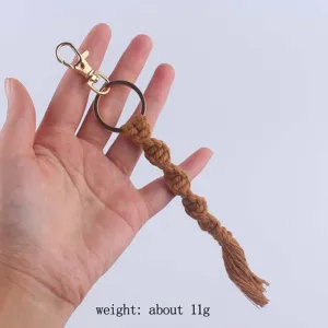 Handmade macrame keychain with gold hardware, lightweight cotton cord keyring accessory.