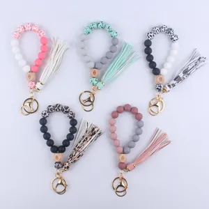 Silicone Bead Wristlet Keychain With Evil Eye Beech Wood Bead Leather Tassel Bracelet Key Ring For Women Fashion Jewelry