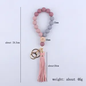 Silicone bead wristlet keychain detail showing exact size dimensions and tassel specifications