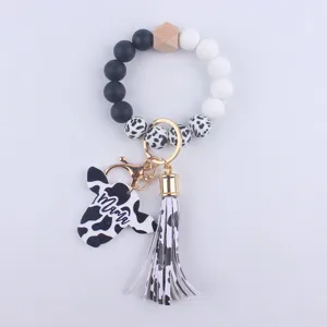 Cow print silicone bead keychain bracelet with wooden bead and Mama tassel pendant