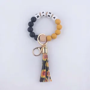 Silicone bead keychain bracelet with MAMA letters and sunflower tassel for daily use.