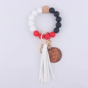 Silicone bead wristlet keychain with wood bead, leather tassel and MAMA wooden disc.