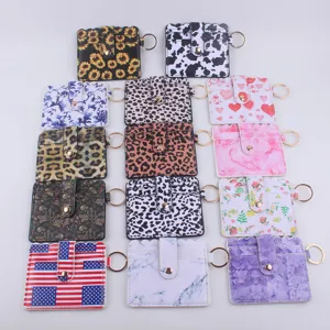 PU leather card holder with key ring, assorted cute prints for credit cards and coins.