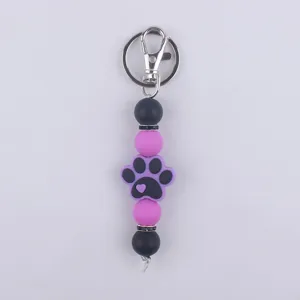 Llavero de cuentas de silicona bonito con colgante de pata para bolso y llaves.