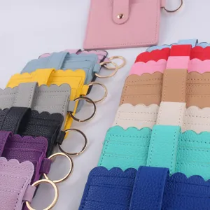 Multi-color PU leather card holder wallet with key ring and snap closure for daily use detail.