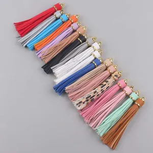 Ciondolo Portachiavi con Nappa in Pelle PU Cappuccio in Metallo Dorato Nappe Lunghe per Decorazione Borsa Gioielli Fai da Te