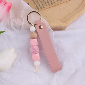Portachiavi in pelle fatto a mano perla di silicone rosa ciondolo in legno auto borsa