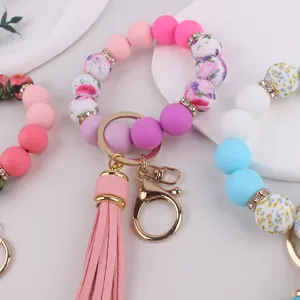 Llavero de pulsera con cuentas de silicona con borla, anillo de llavero elegante para damas.