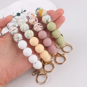 Silicone bead wristlet keychain for women, stylish and practical everyday accessory.