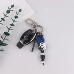 Stijlvolle autosleutelhanger met Mercedes-logo, yin yang zon maan siliconen kralenhanger.