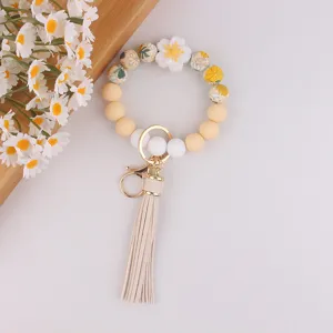 Silikon Perlen Schlüsselanhänger mit Blumen Anhänger und Quaste Armband für Damen.