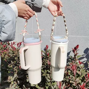 Handgemachte geflochtene Tassenkordel und Griffhülle für Stanley Becher, süßes Schleifendesign.