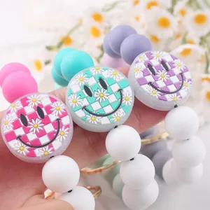 Cute smiley silicone bead keychain bracelet, colorful checkerboard daisy beaded bag charm accessory.