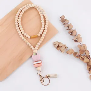 Wooden bead teacher lanyard with cute silicone apple book charm tassel and metal keychain.