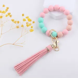 Silicone bead keychain bracelet with PU leather tassel stylish accessory for keys and bags