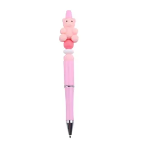 Pink DIY beaded ballpoint pen featuring a cute silicone bear top and creative handmade bead details.