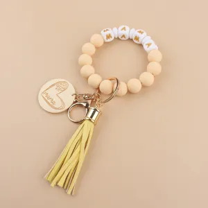 Silikon Perlen Armband Schlüsselanhänger mit Holz Herz Anhänger und Quaste für Damen Alltag.